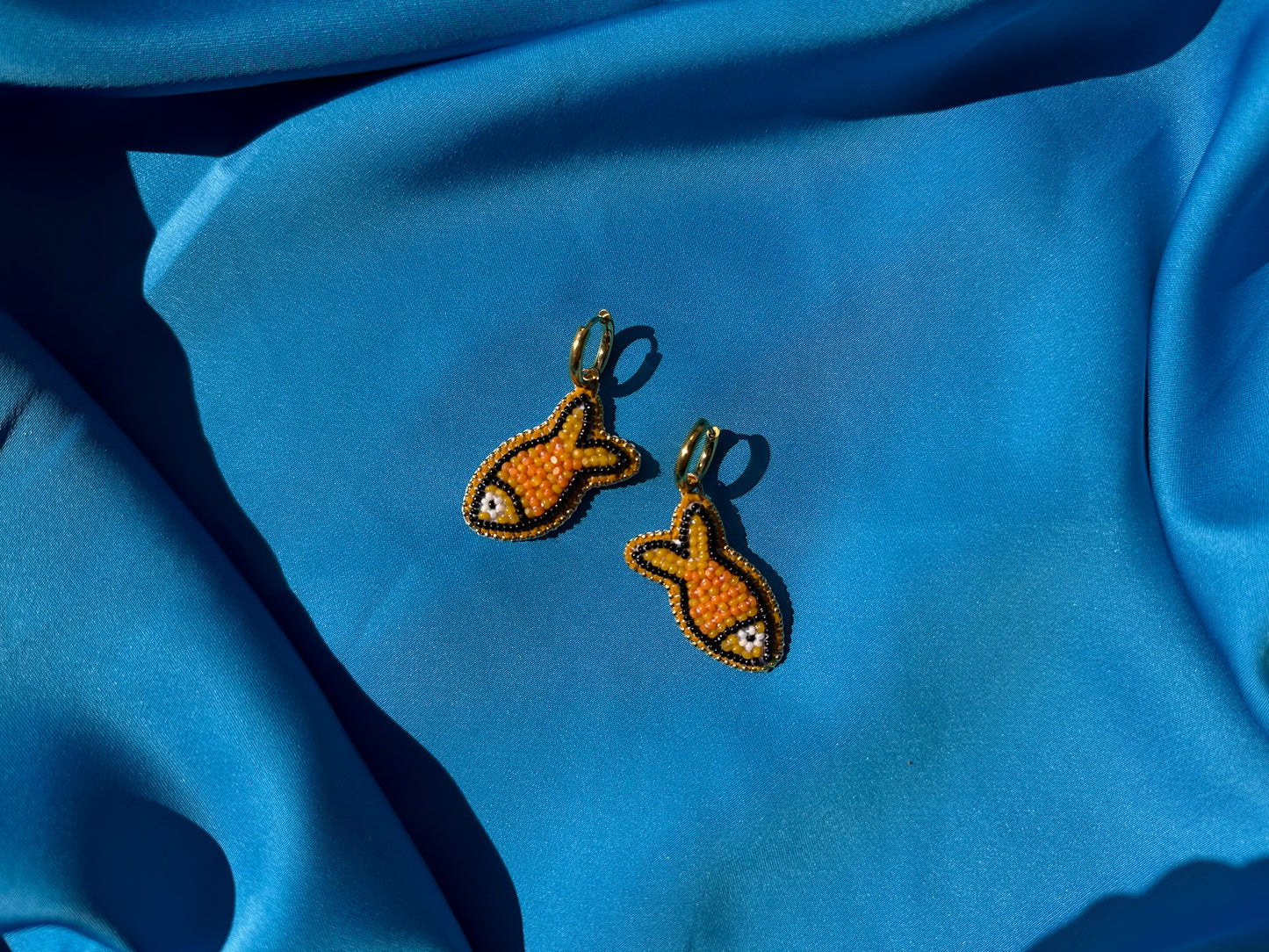 orange fish earrings w/ hoops