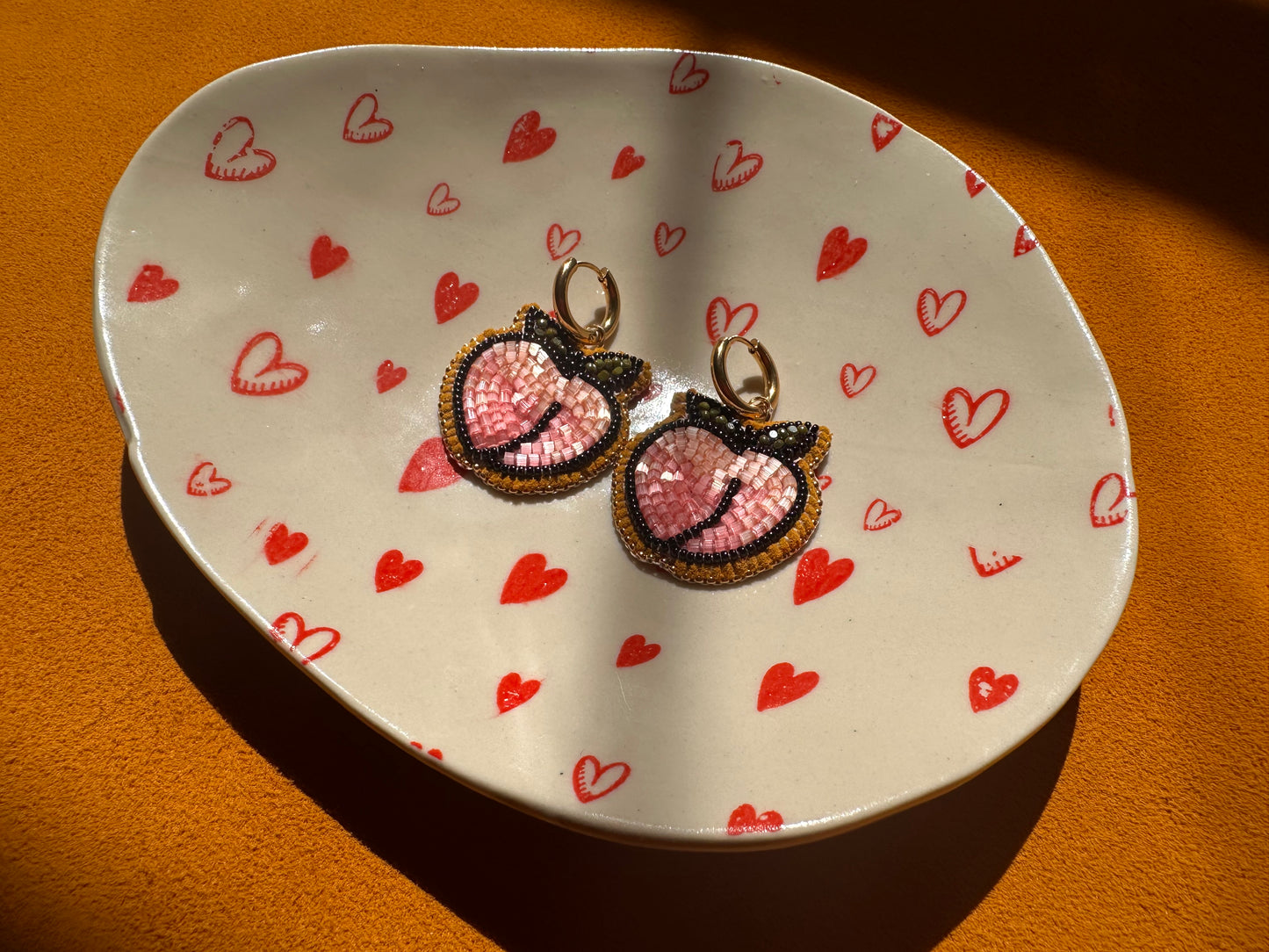 peach earrings w/ hoops