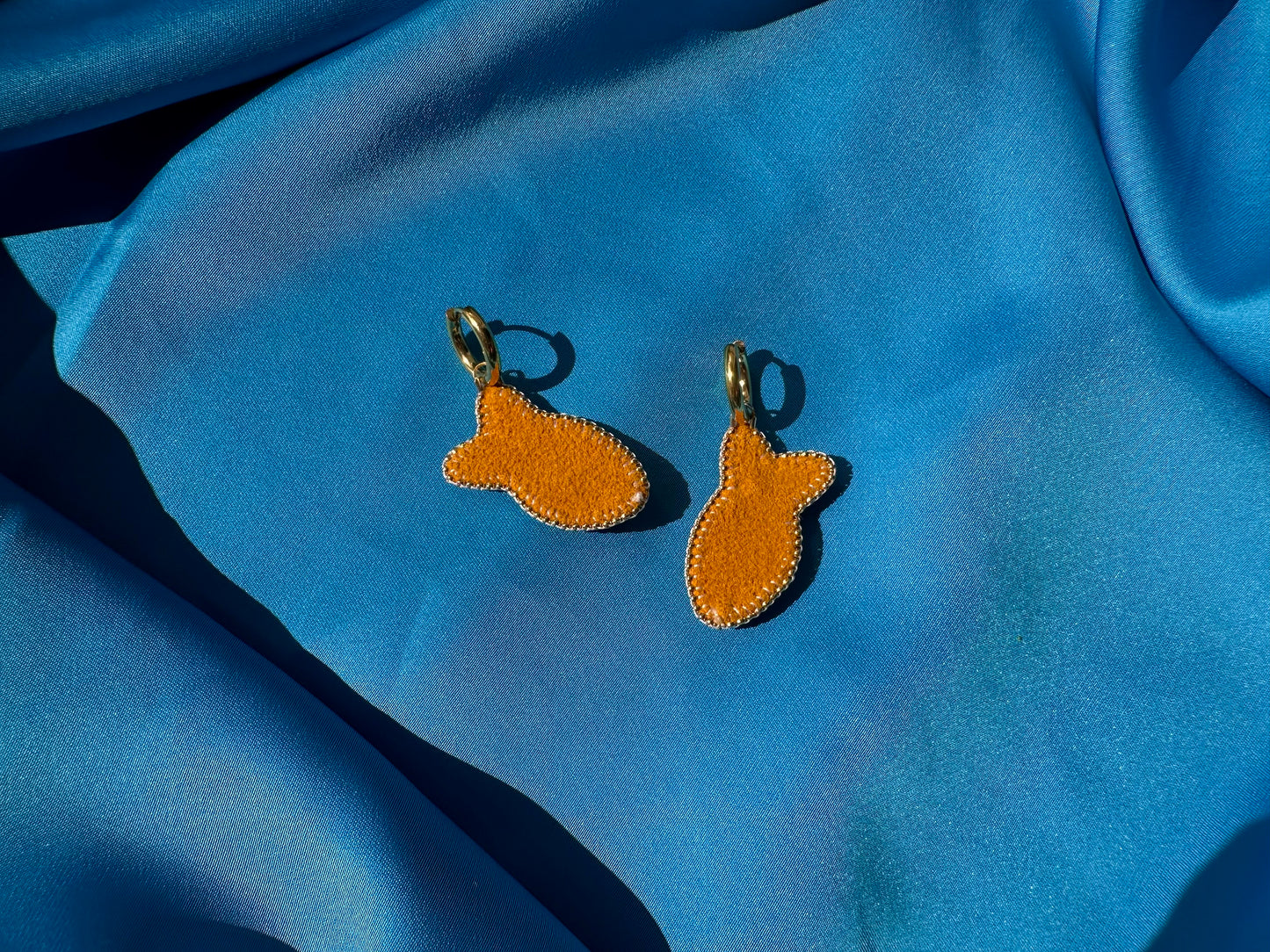 orange fish earrings w/ hoops