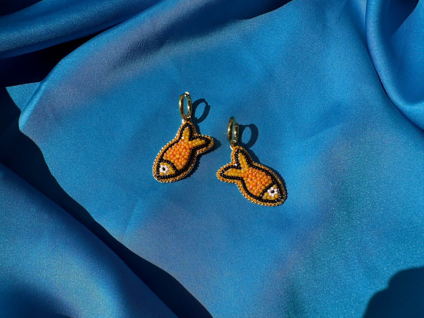 orange fish earrings w/ hoops