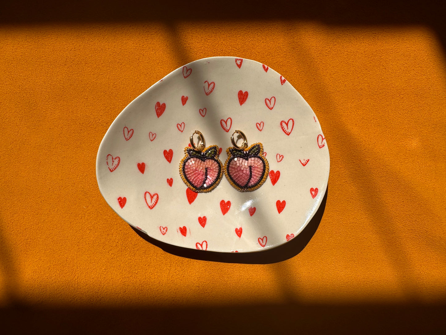 peach earrings w/ hoops