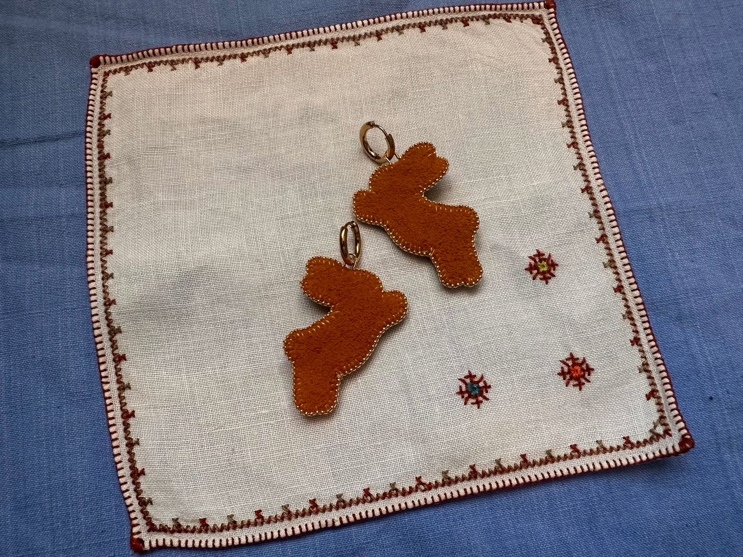 bunny earrings in beige