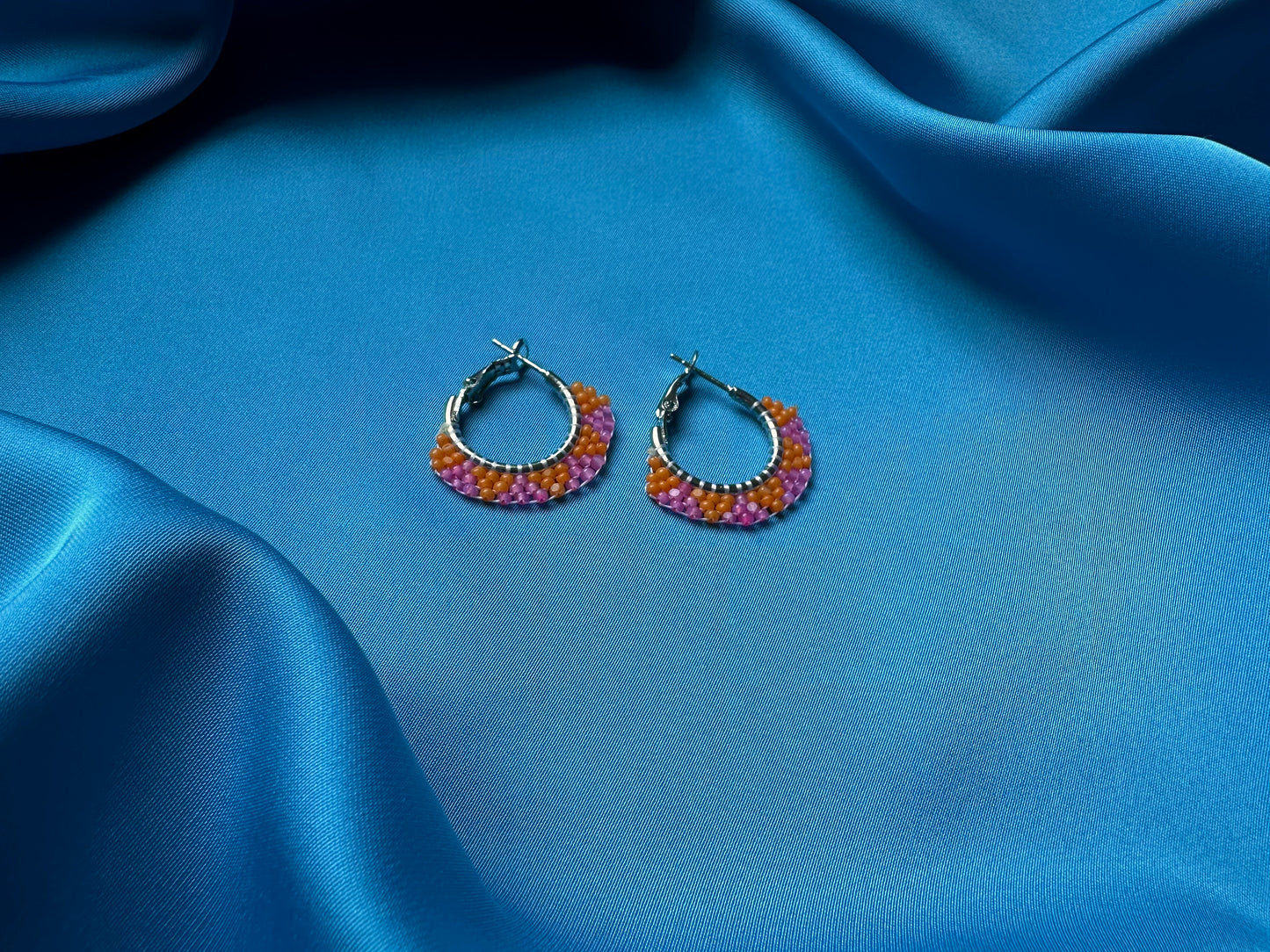 mini beaded hoops in orange & pink