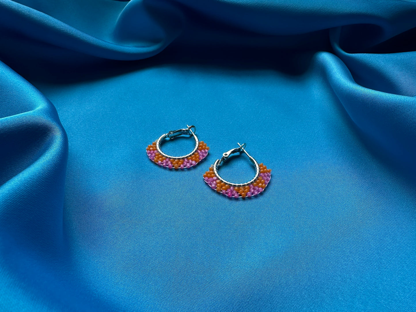 mini beaded hoops in orange & pink