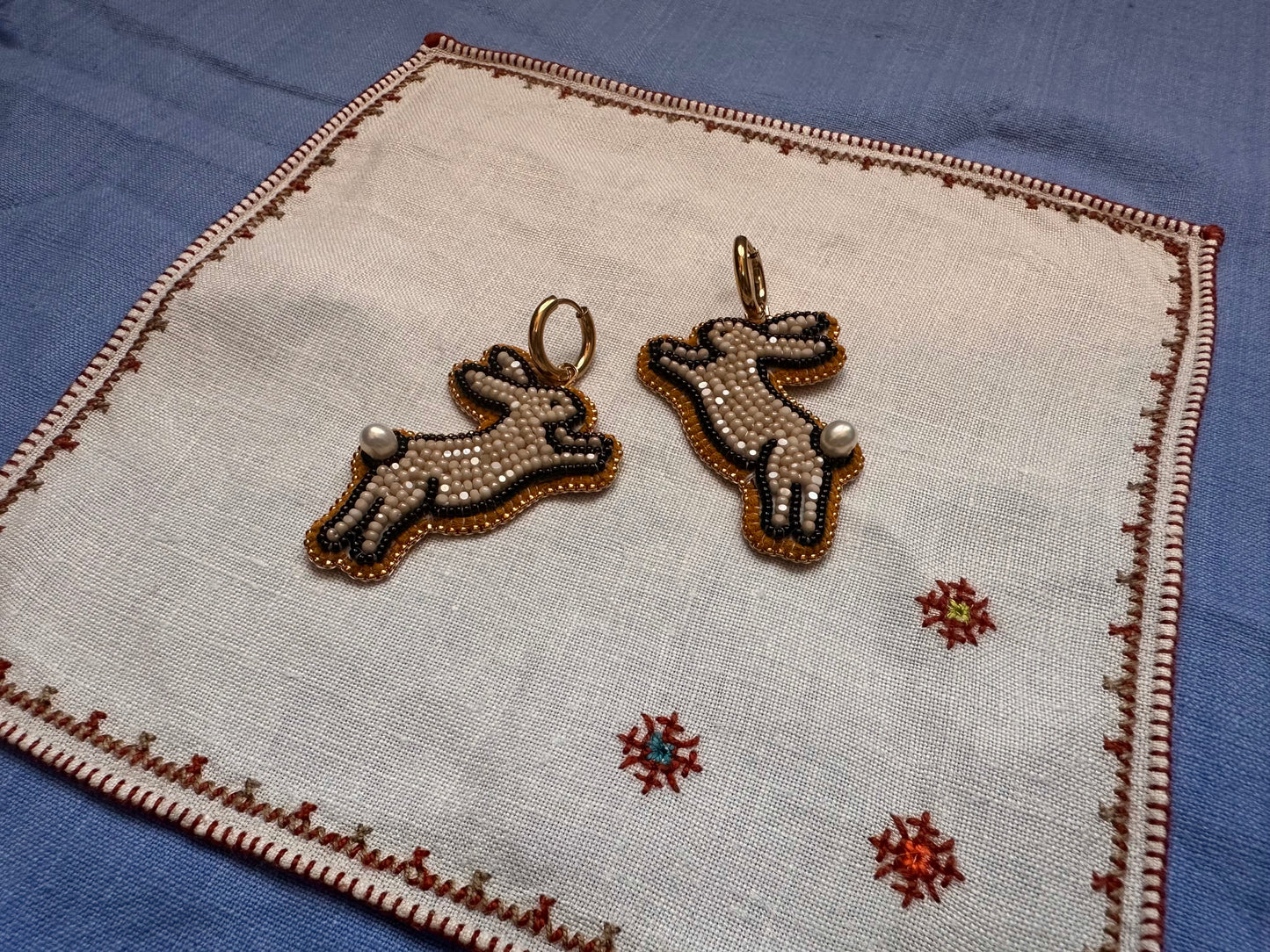 bunny earrings in beige