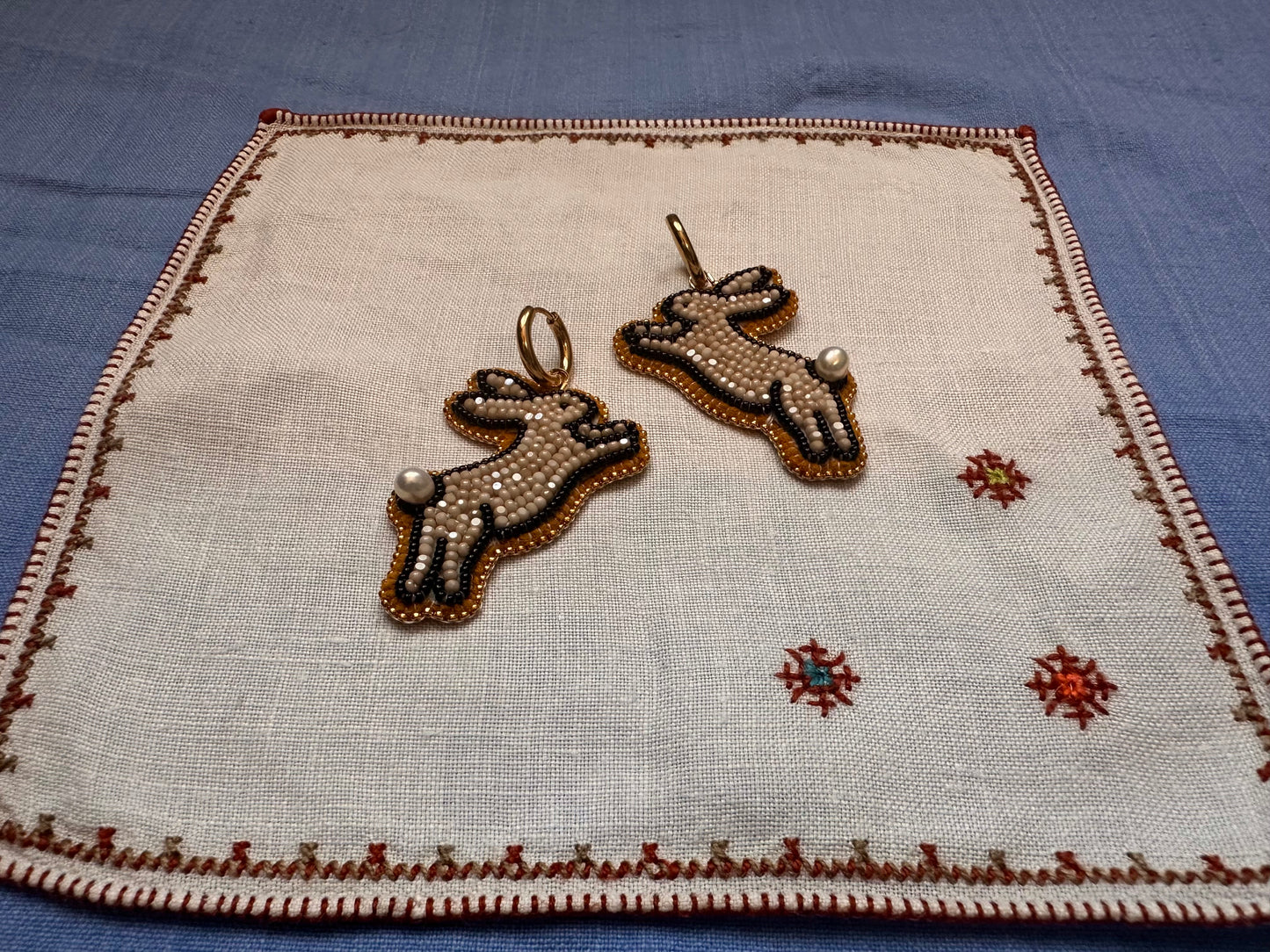 bunny earrings in beige