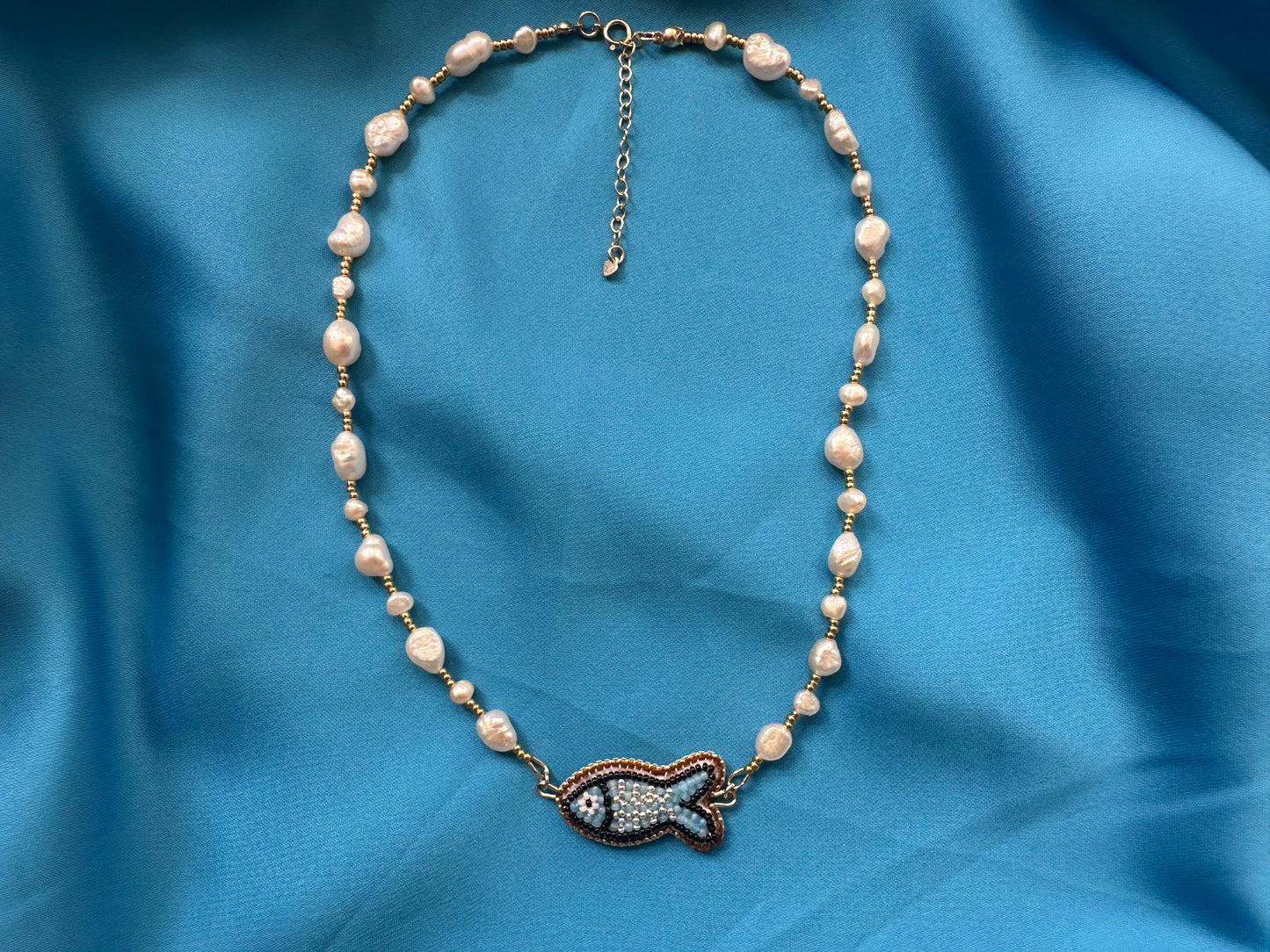 light blue fish necklace