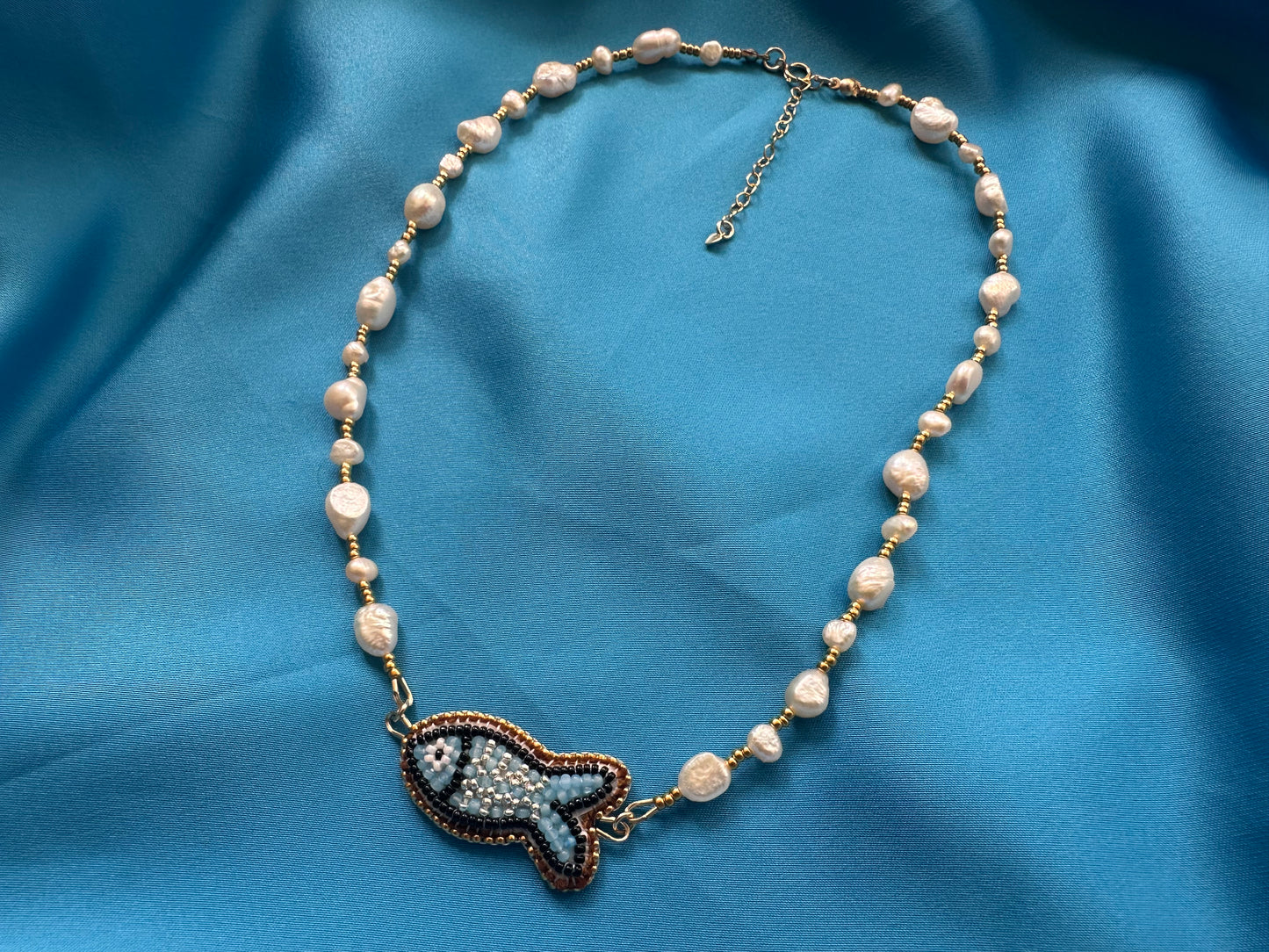 light blue fish necklace