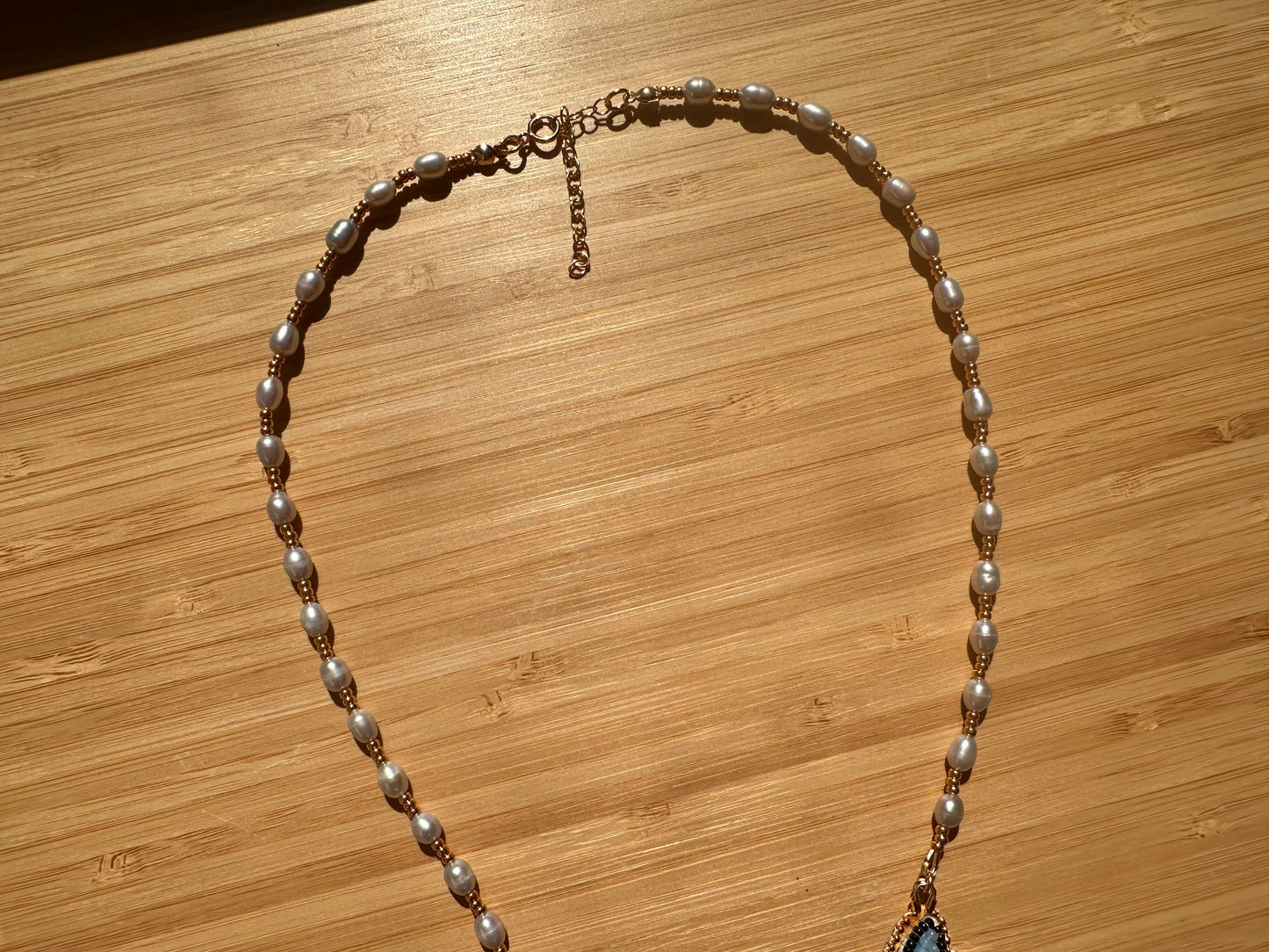 kissing fish necklace