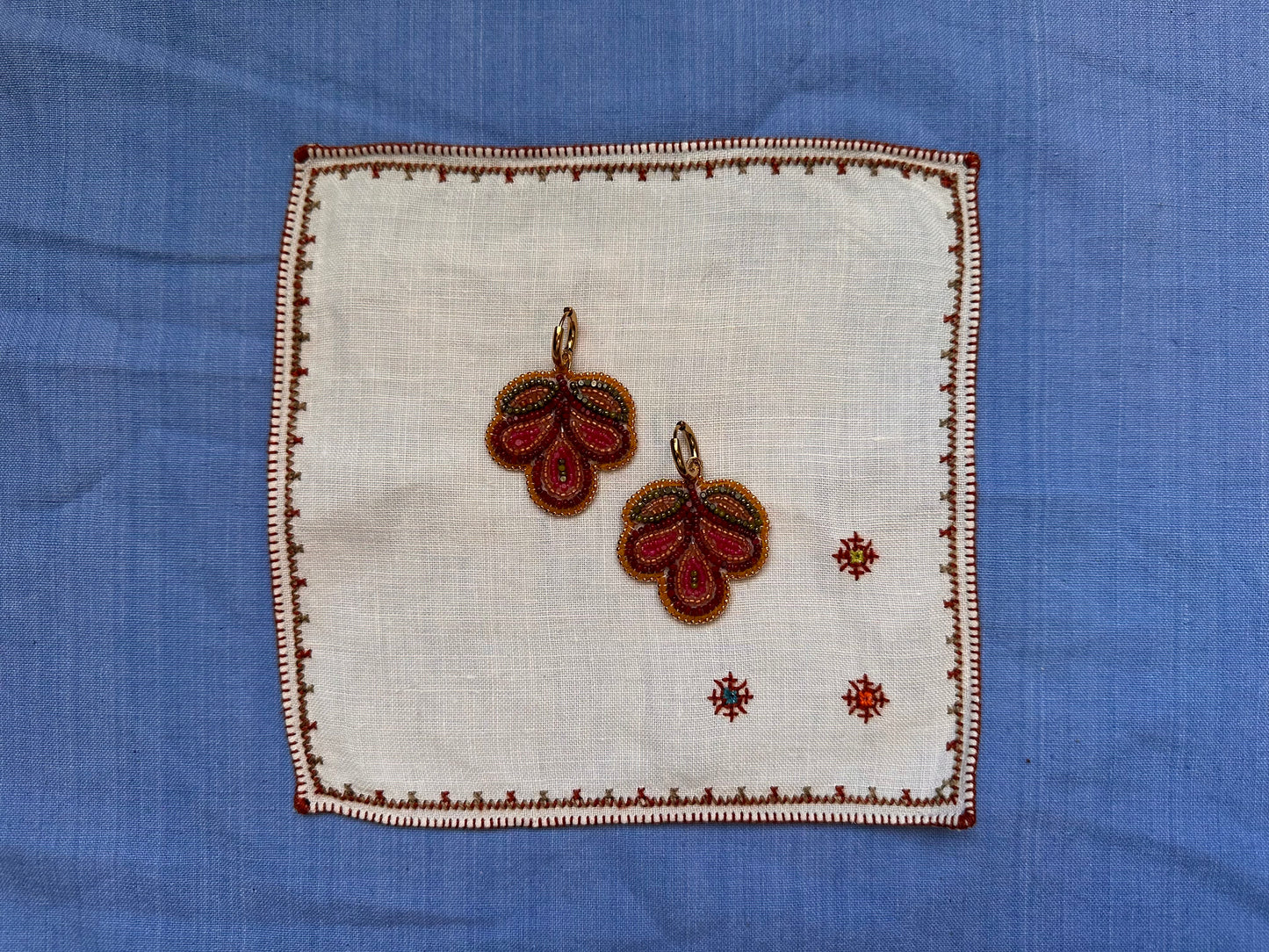 3 petal floral earrings in cranberry