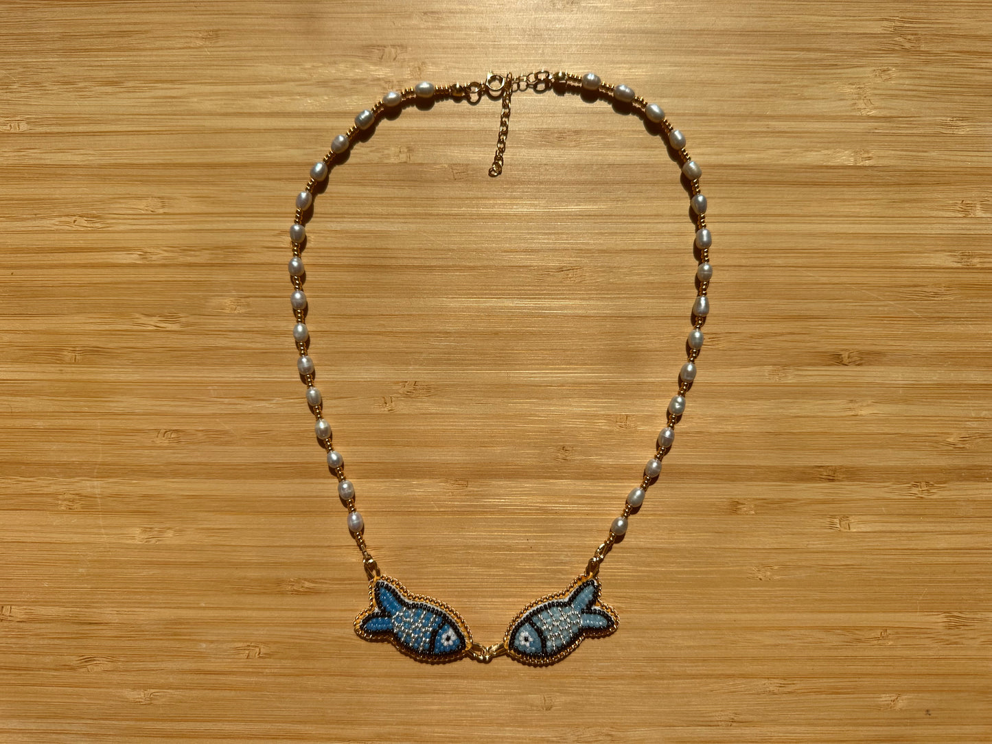 kissing fish necklace
