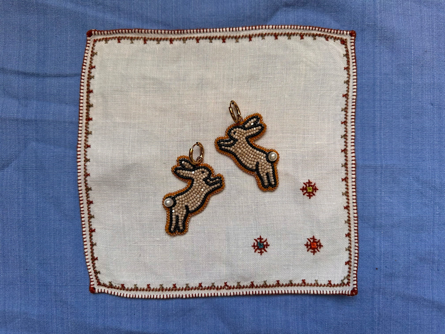 bunny earrings in beige