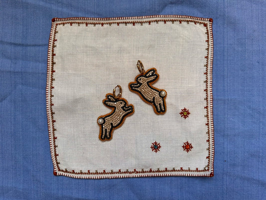 bunny earrings in beige