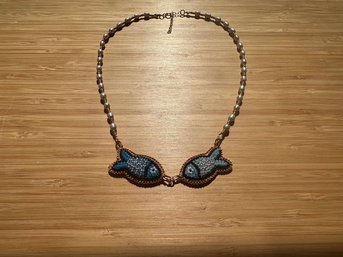 kissing fish necklace
