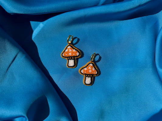 mushroom earrings in orange & white