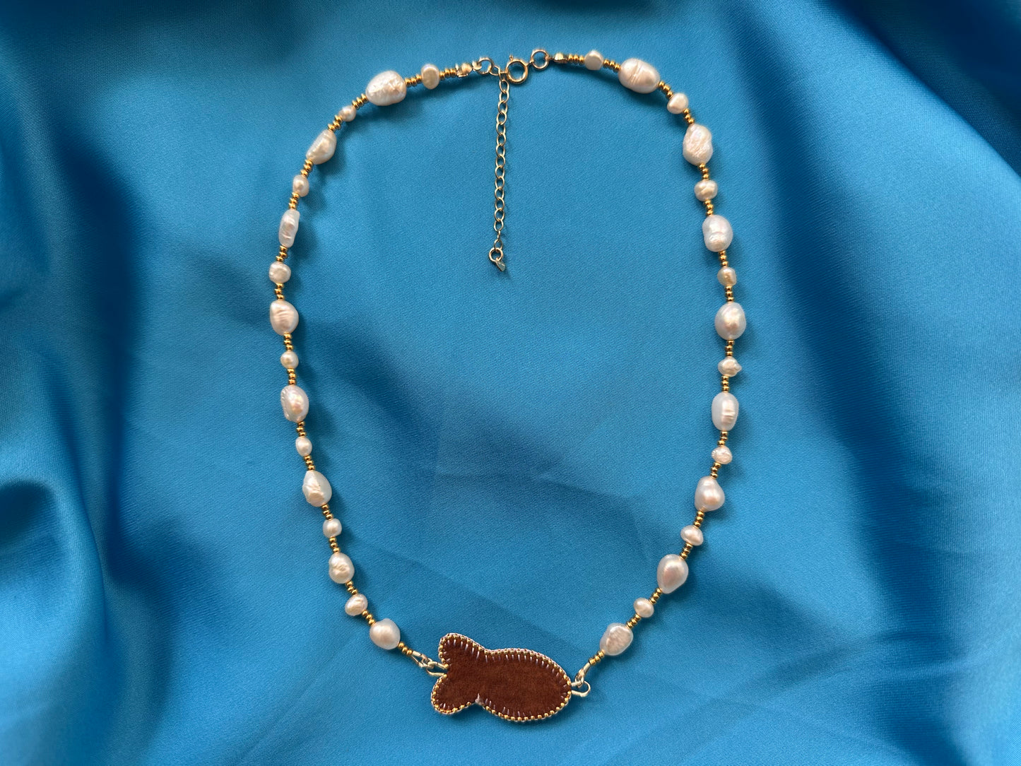 light blue fish necklace