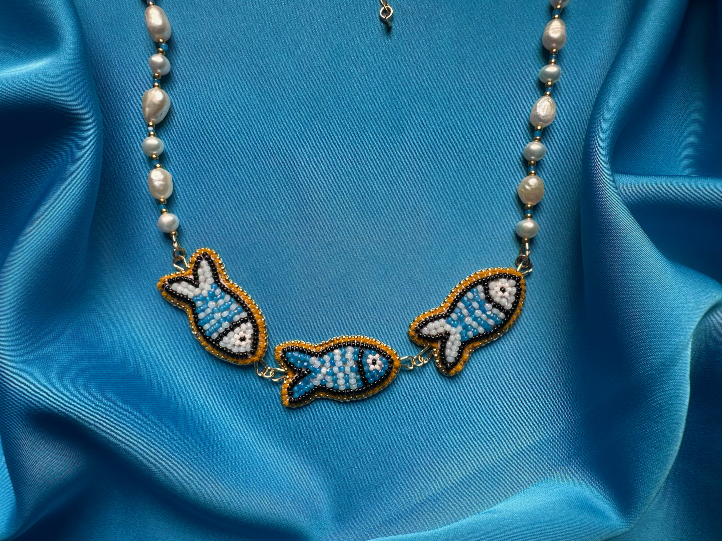 triple fish necklace