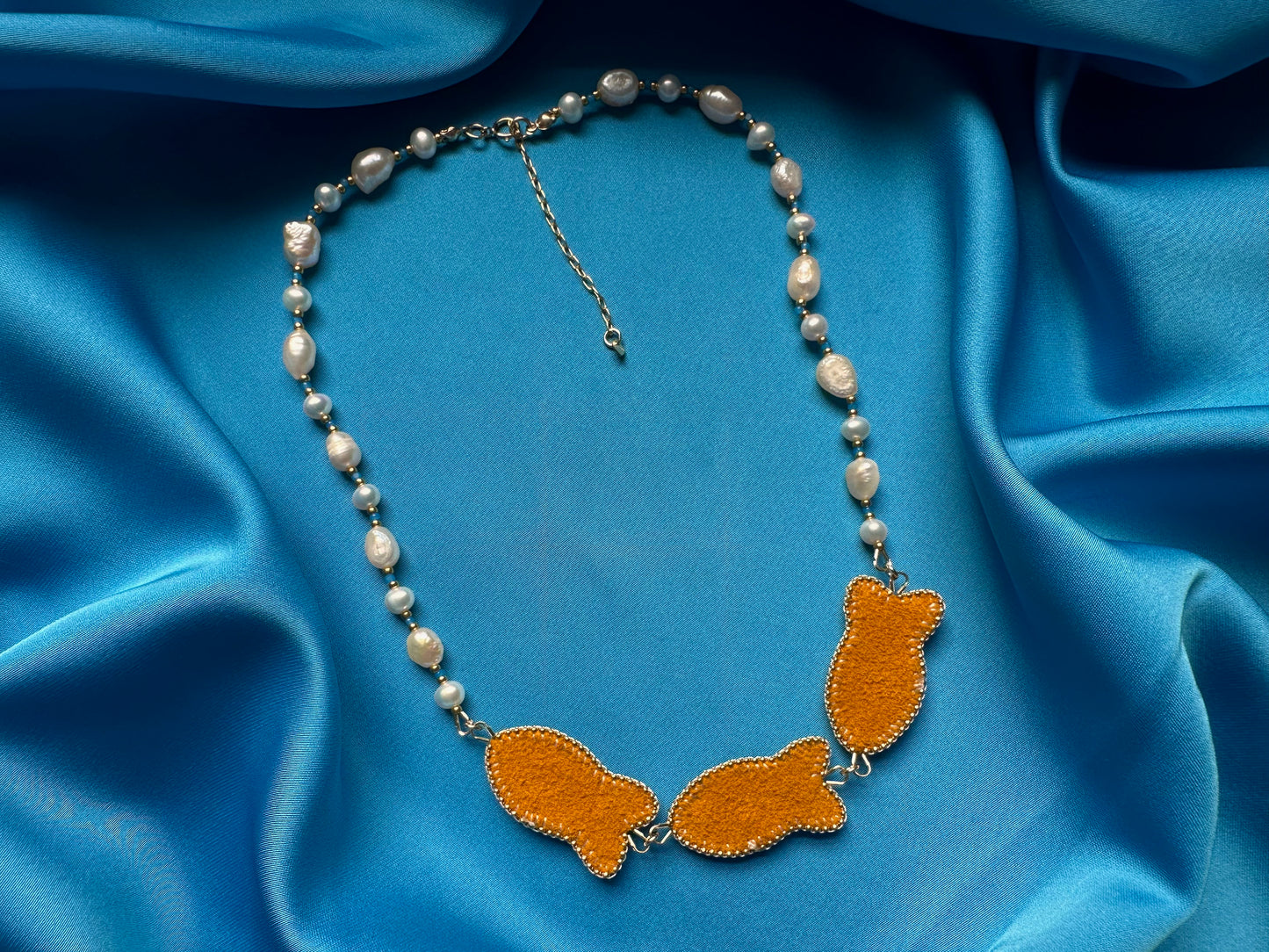 triple fish necklace